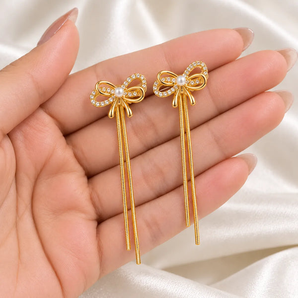 Elowen Crystal Bow Tassel Drop Earrings
