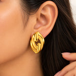 Golden Sculptural Wave Stud Earrings 1